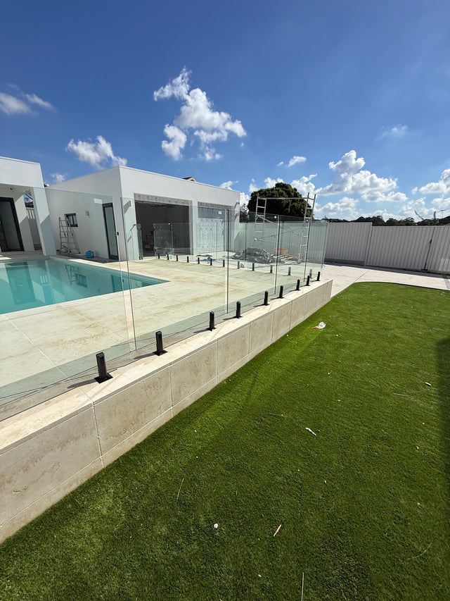 Raised pool surround and glass boundary viewed from the backyard, Punchbowl.