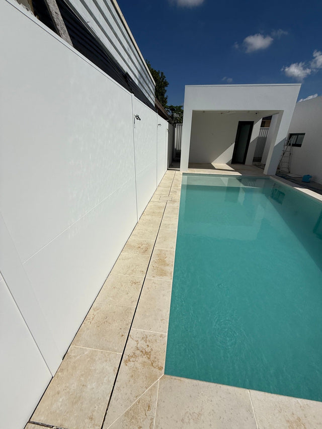 Pool coping along the boundary wall, Punchbowl.