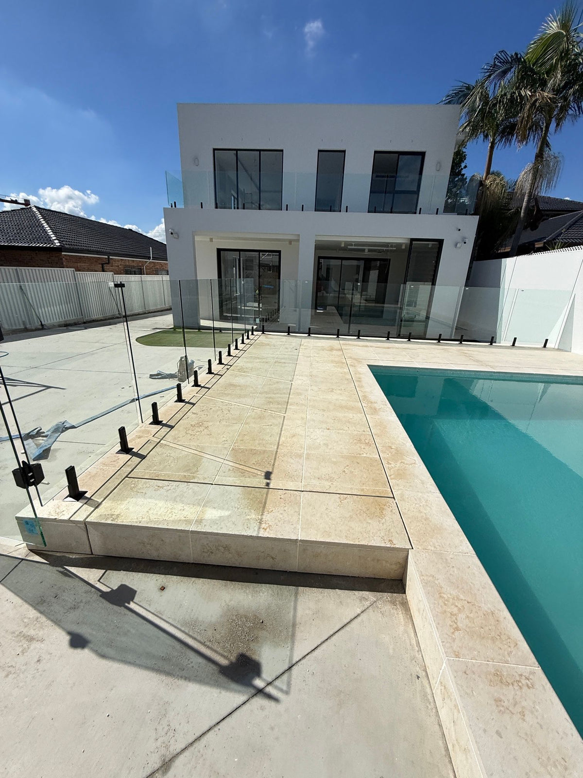 Pool paving and coping viewed towards the residence, Punchbowl.