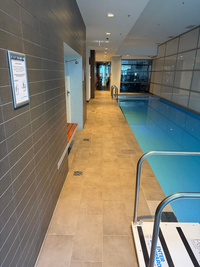 Wide indoor pool and tiled surround view in Milsons Point - After Job
