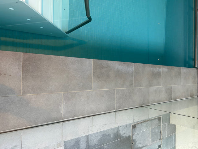 Indoor pool coping and tiled wall in Milsons Point - After cleaning