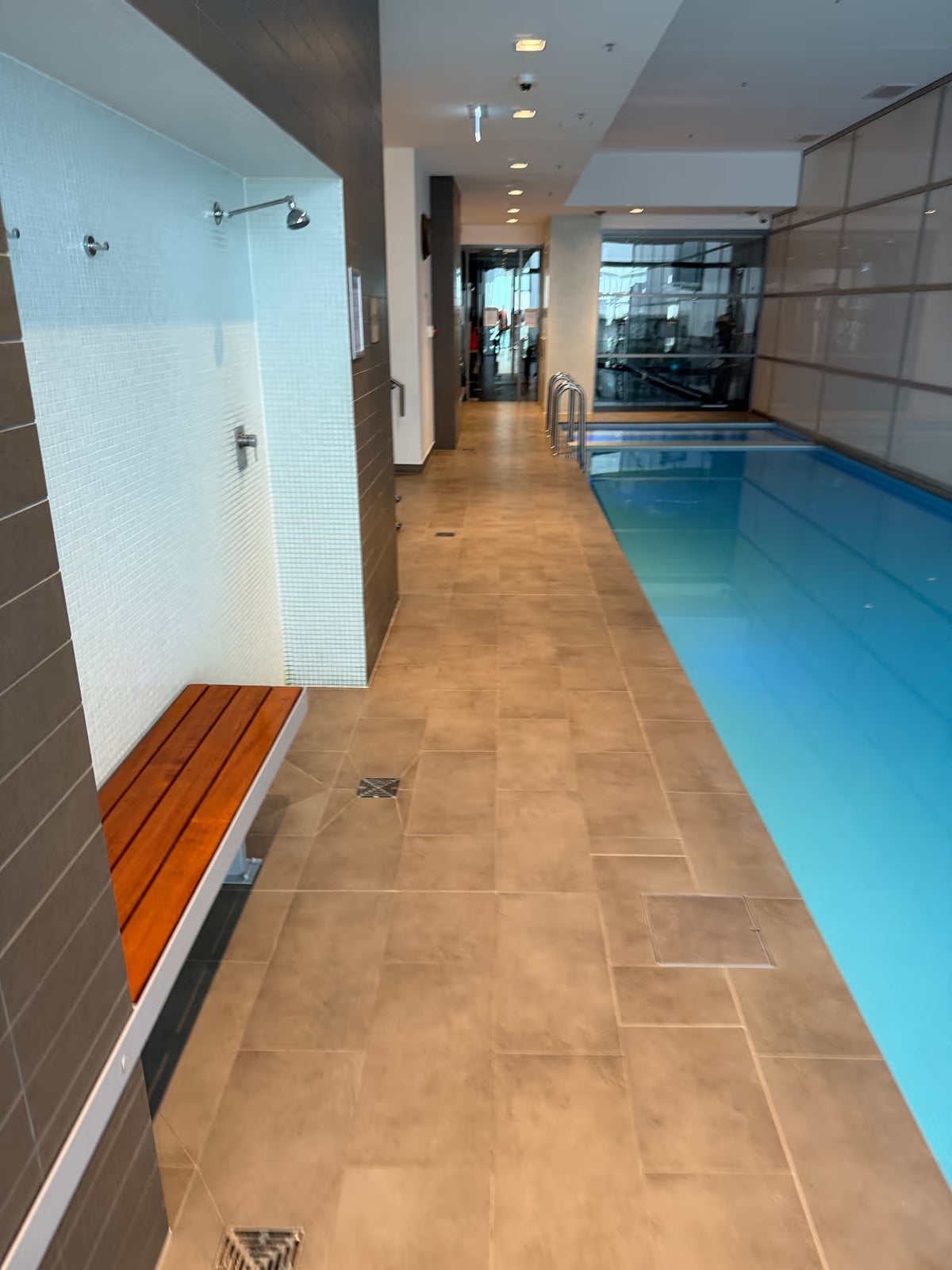 Indoor tiled pool surround after documented cleaning and sealing work in Milsons Point - After Job