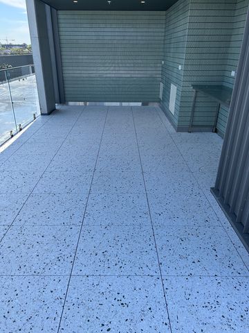 Podium Paver Cleaning and Anti-Slip Sealing - Alexandria - project photo 6