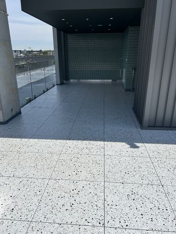 Podium Paver Cleaning and Anti-Slip Sealing - Alexandria - project photo 9