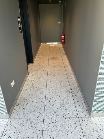 Podium Paver Cleaning and Anti-Slip Sealing - Alexandria - project photo 12