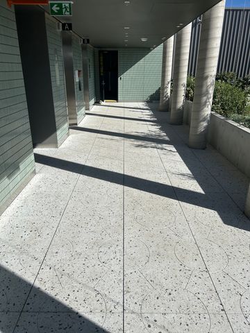 Podium Paver Cleaning and Anti-Slip Sealing - Alexandria - project photo 19